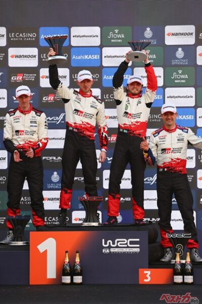 ワークス初戦でモンテカルロを制したオリバー・ソルベルグ(中央右)とコ・ドライバーのエドモンドソン(中央左)。2位はエバンス(左)、3位オジエ(右)とトヨタが表彰台を独占<br>